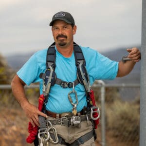 Man wearing climbing gear